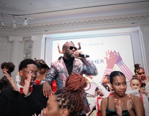 Wyclef Jean performs with SCAN-Harbor Performing Arts Academy at Gala October 2022