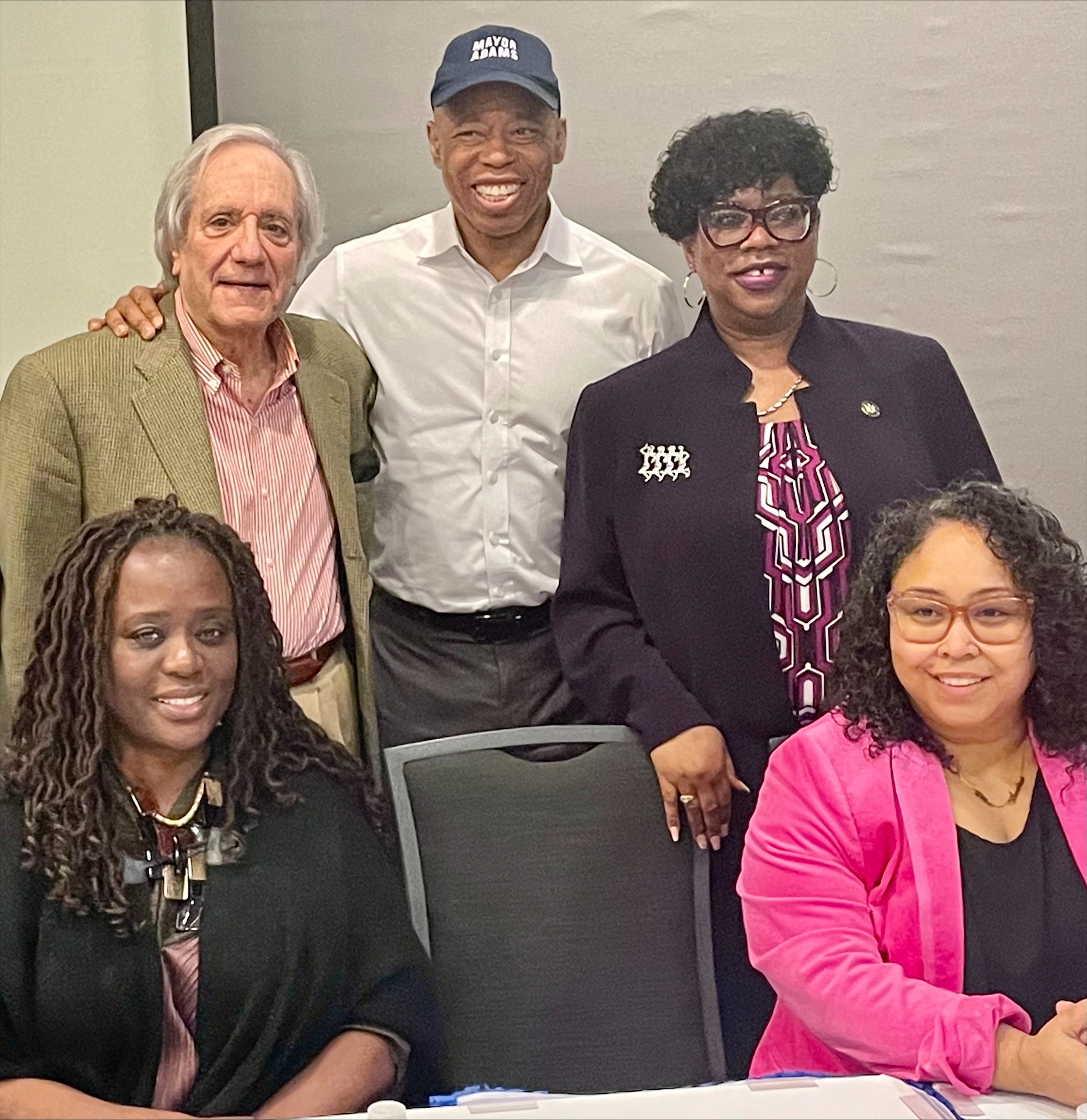 Lew Zuchman of SCAN-Harbor at SOMOS Conference pictured with New York City Mayor Eric Adams, New York State Senator Cordell Cleare, Bronx DA Darcel Clark, and Chief of Staff for City Council Member Diana Ayala- Elsie Encarnacion